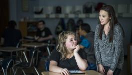 Teacher and student in classroom