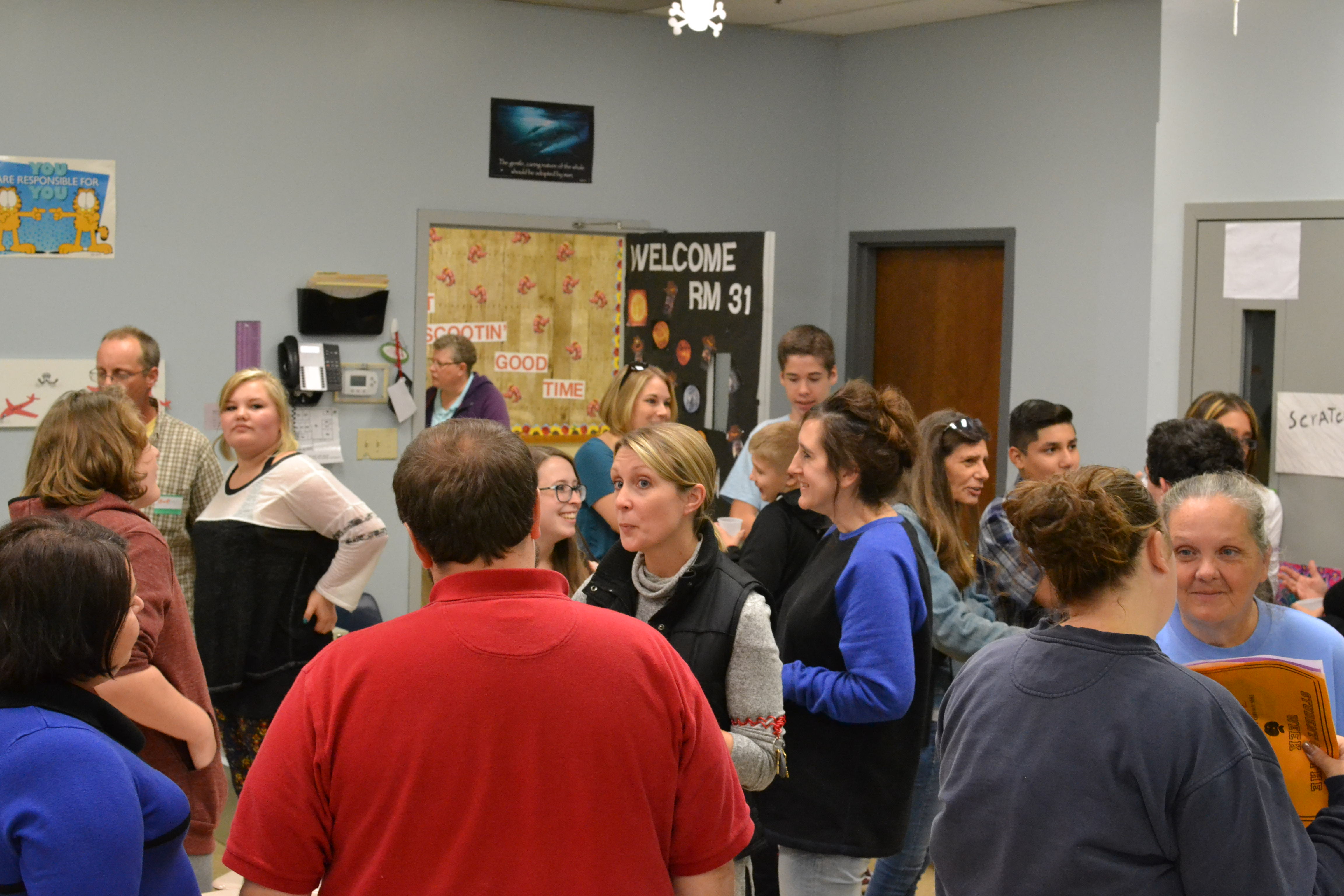 group of adults in a classroom
