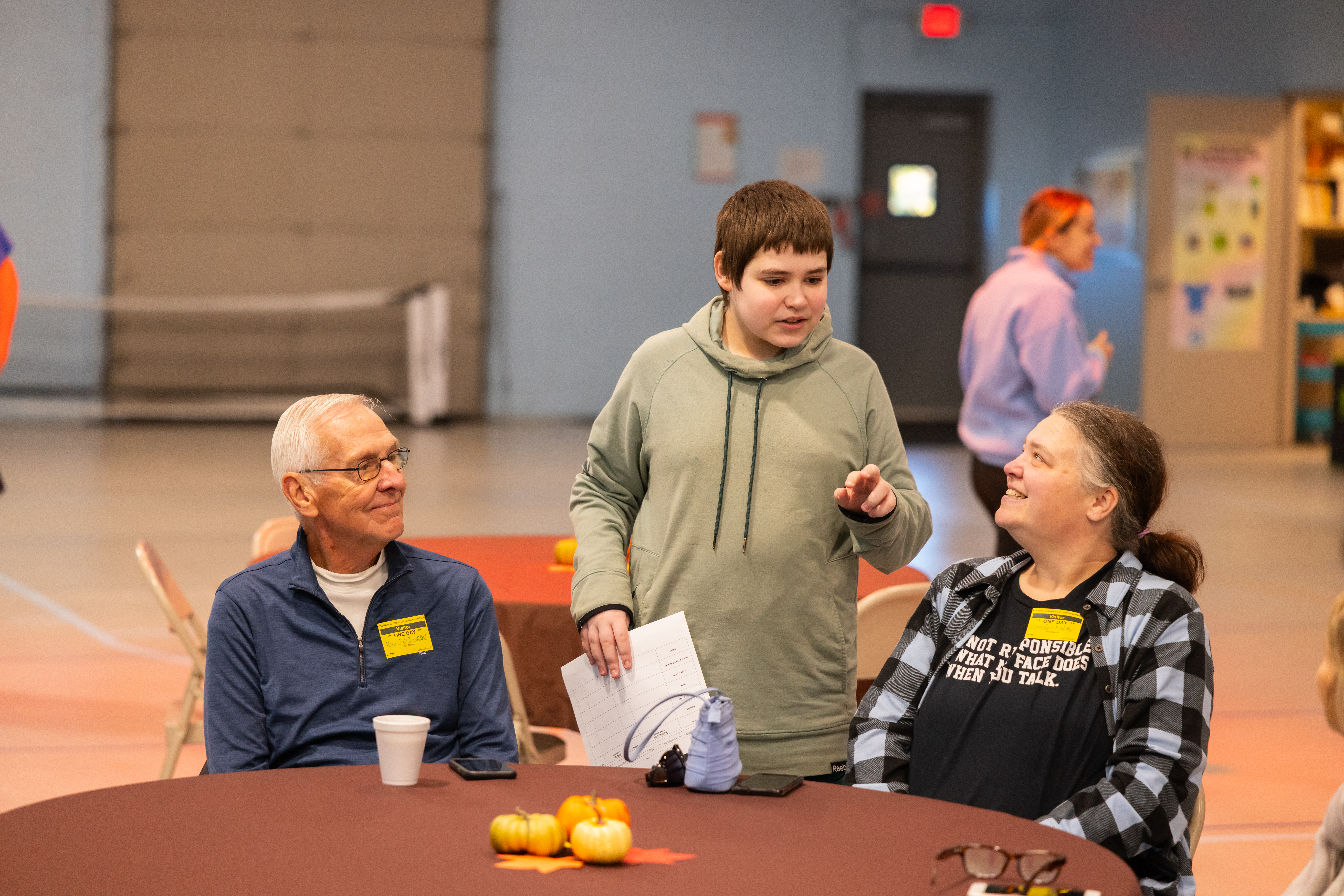student talking to parents