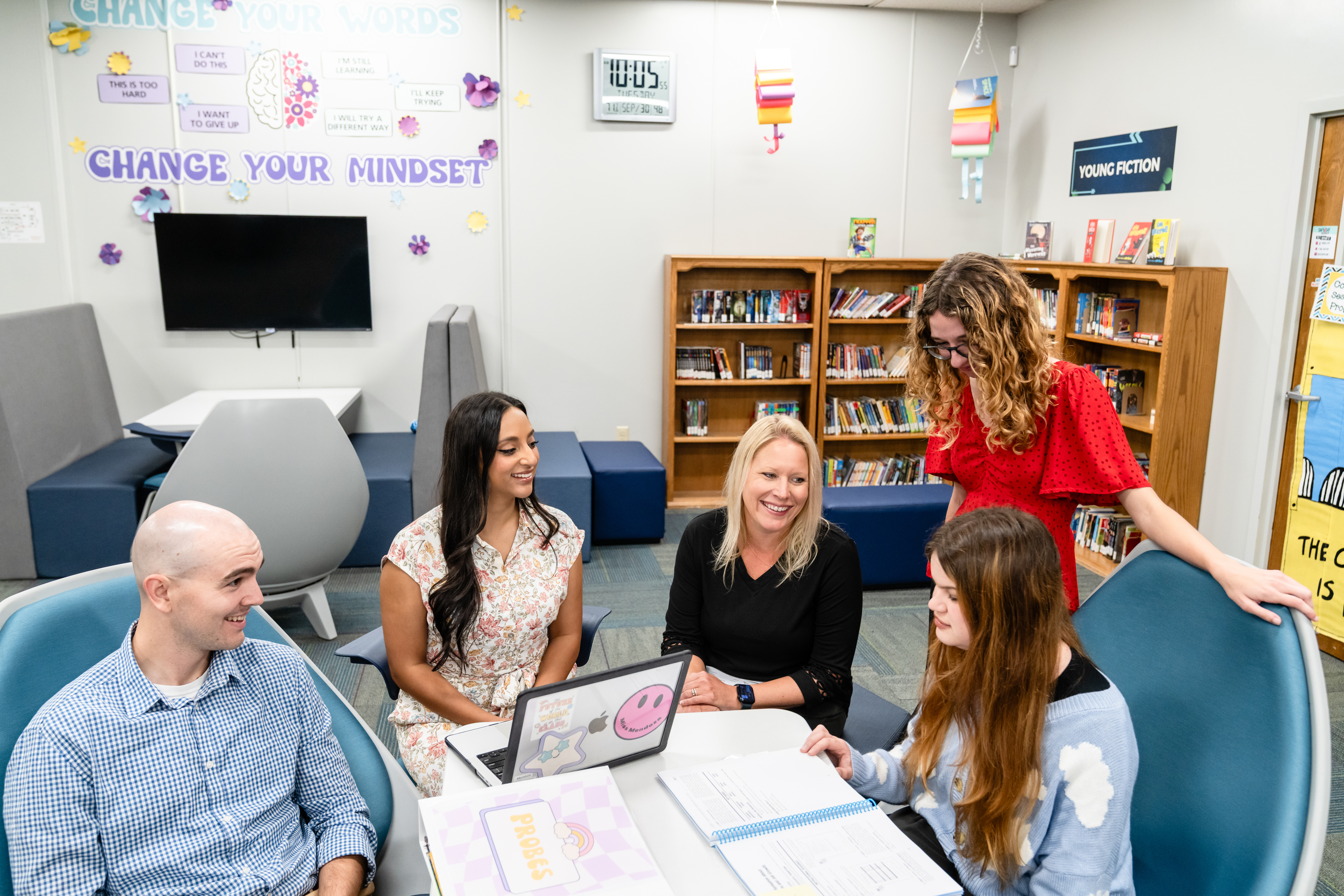 teacher mentoring teacher intern and associate