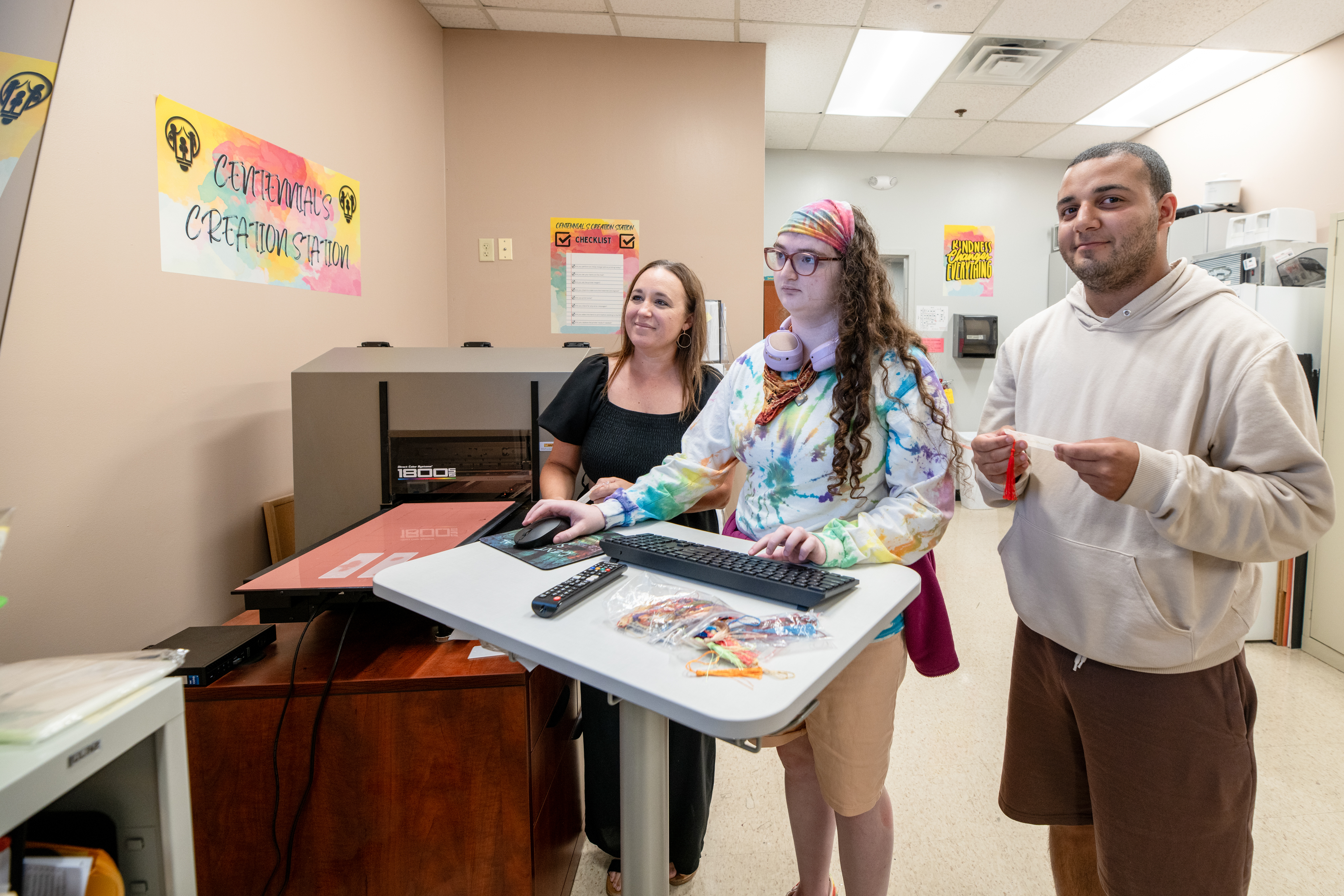 students using UV printer