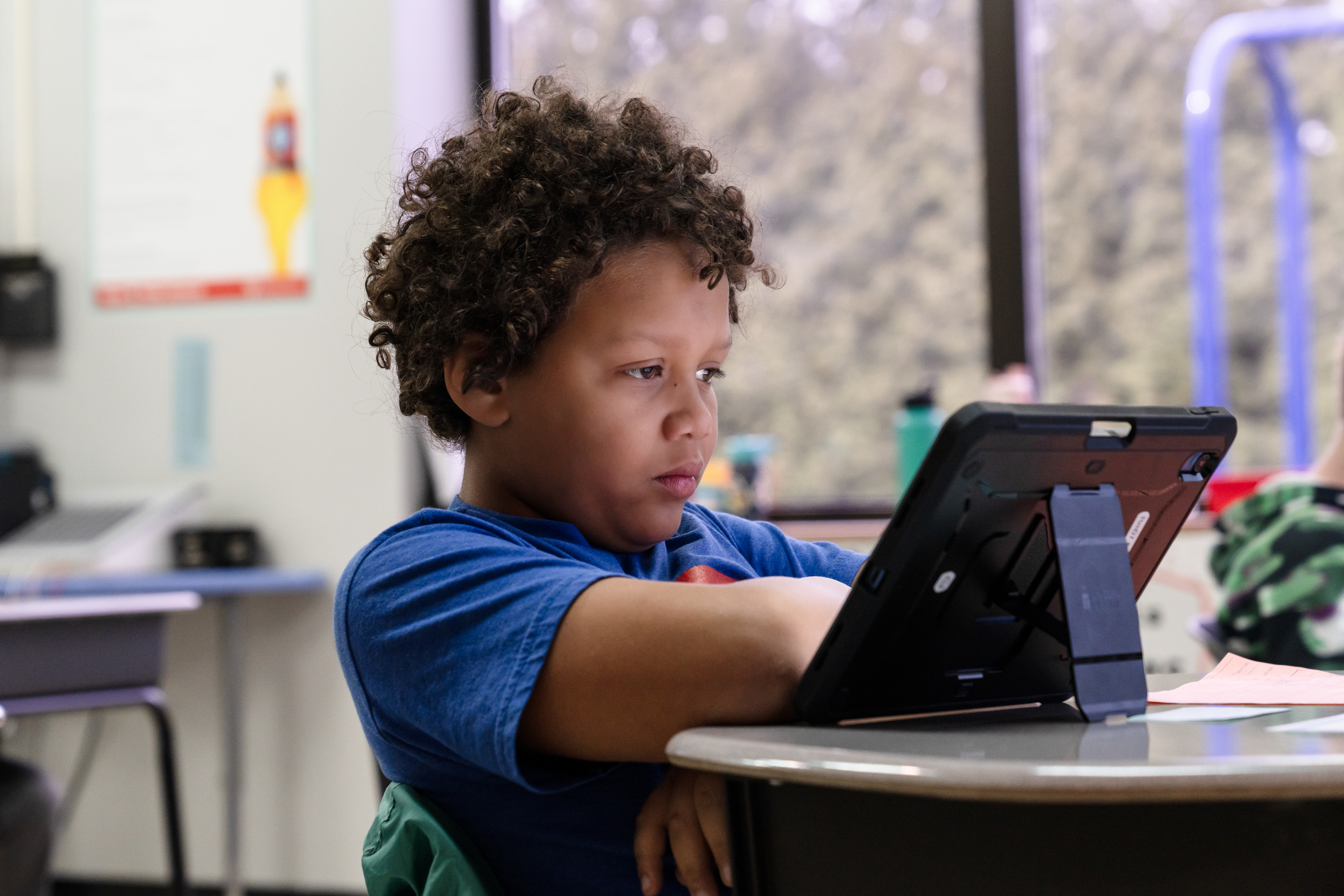 Student looking at iPad